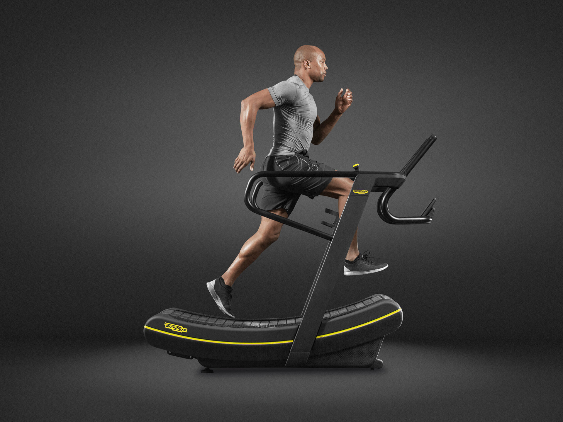 Изогнутая беговая дорожка Technogym SKILLMILL CONSOLE